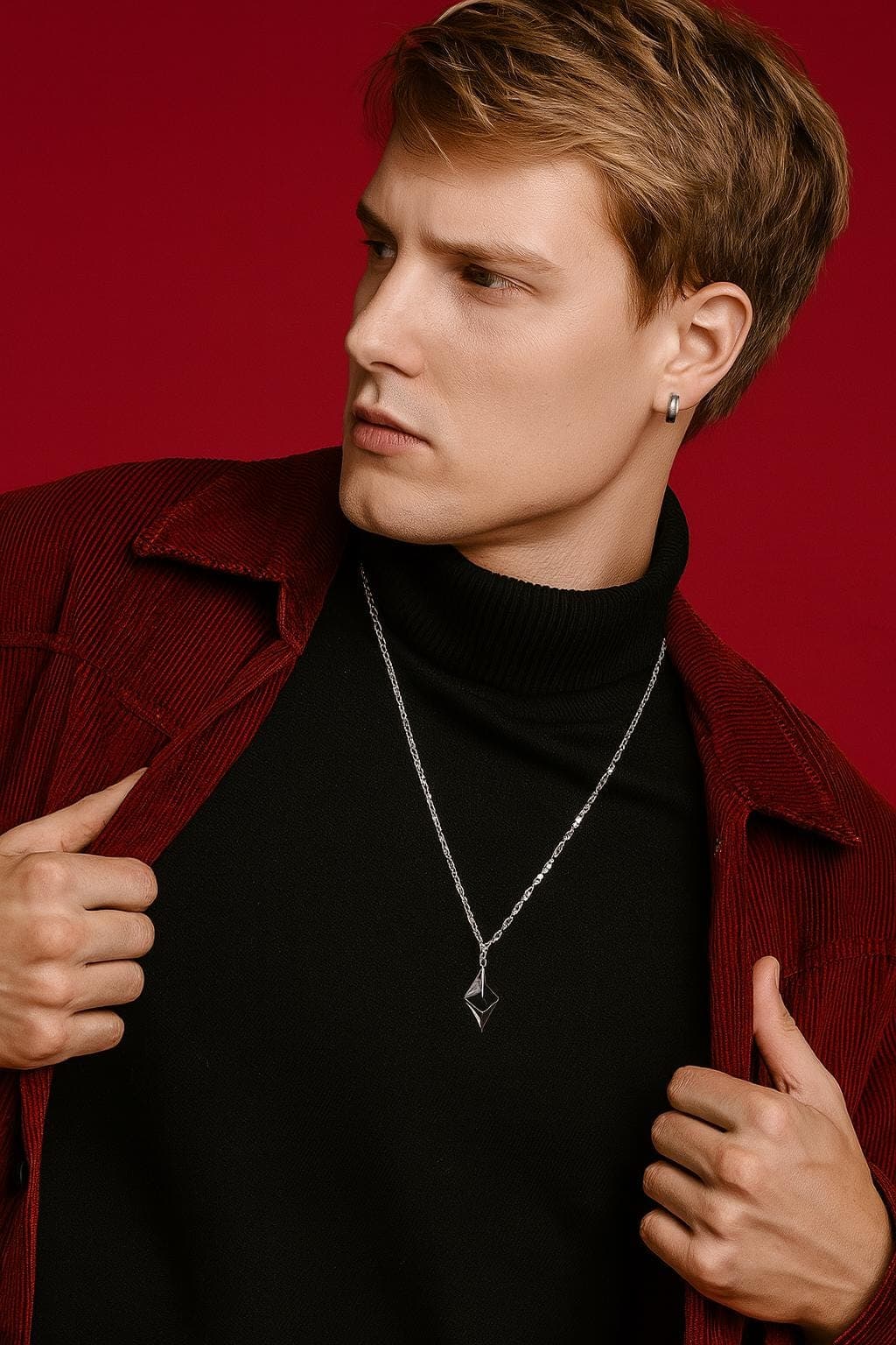 ETH Pendant in 925 silver worn with a black turtleneck and corduroy jacket